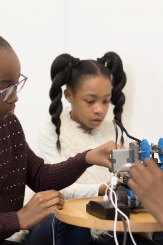 Recycling Cell Phones - kids working on science