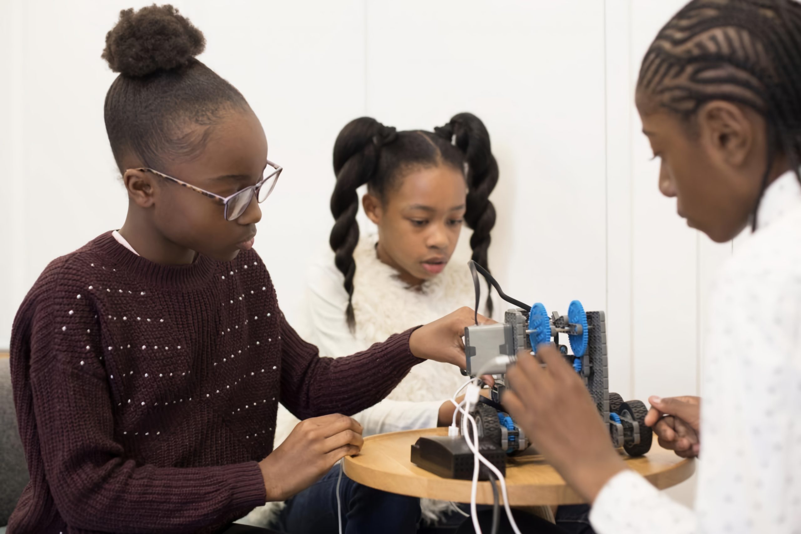 Recycling Cell Phones - kids working on science