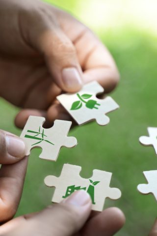 puzzle pieces with eco themed icons - circular economy