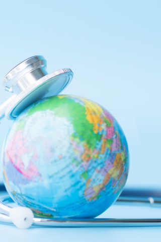 globe and stethoscope - healthcare sustainability