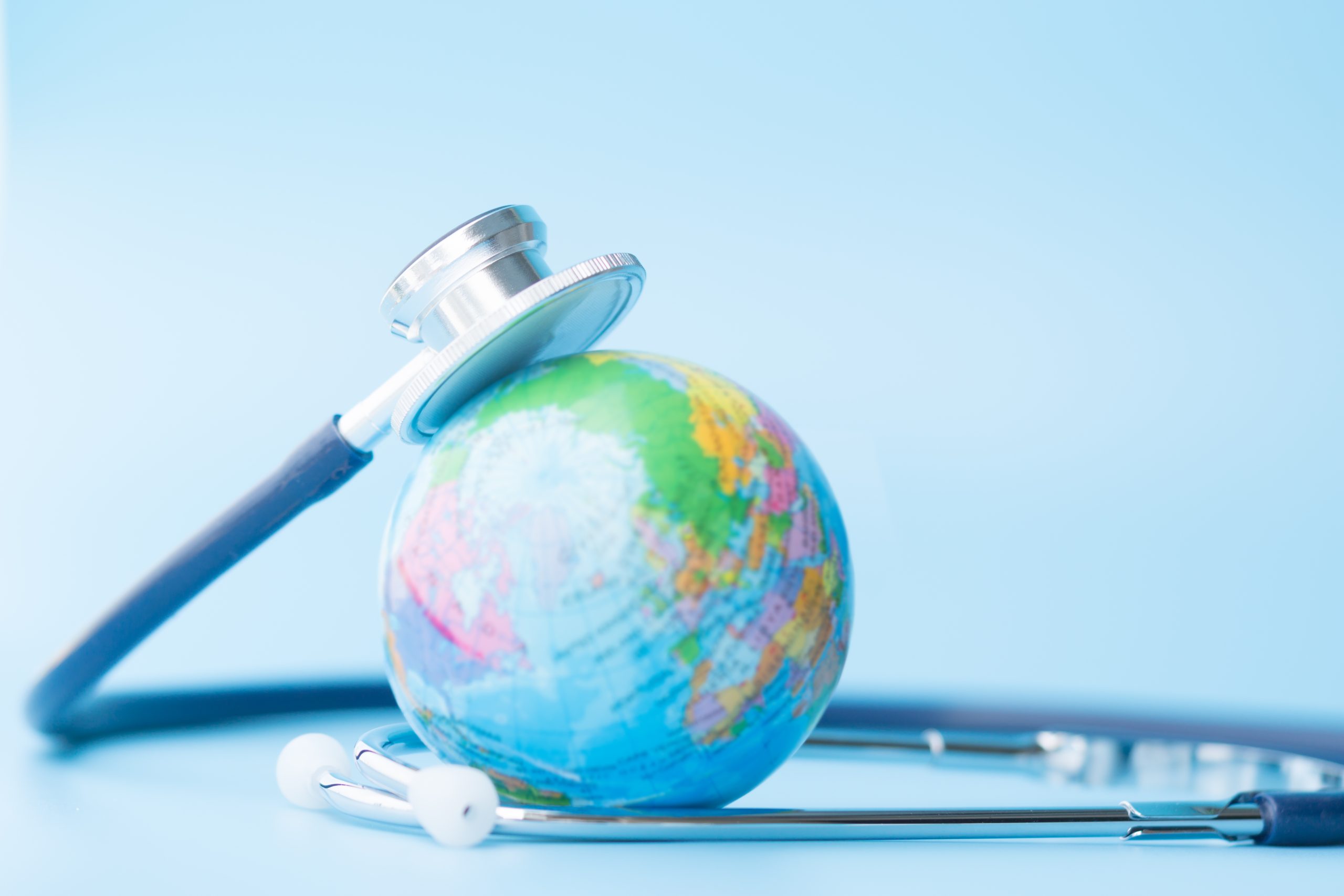 globe and stethoscope - healthcare sustainability