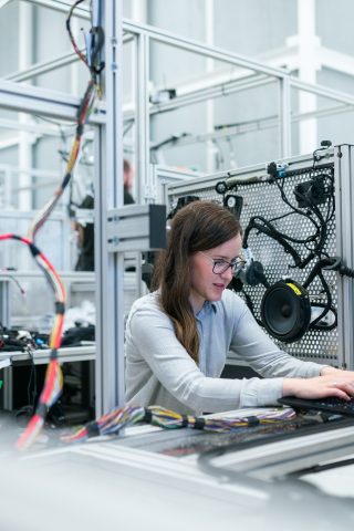 Woman in Machinery Workspace - Deep Tech Manufacturing