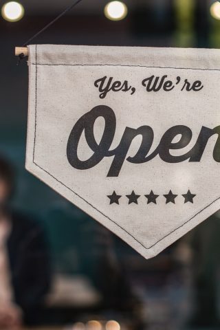 open sign on door - small business sustainability