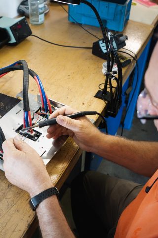 man repairing electronics - Right to repair