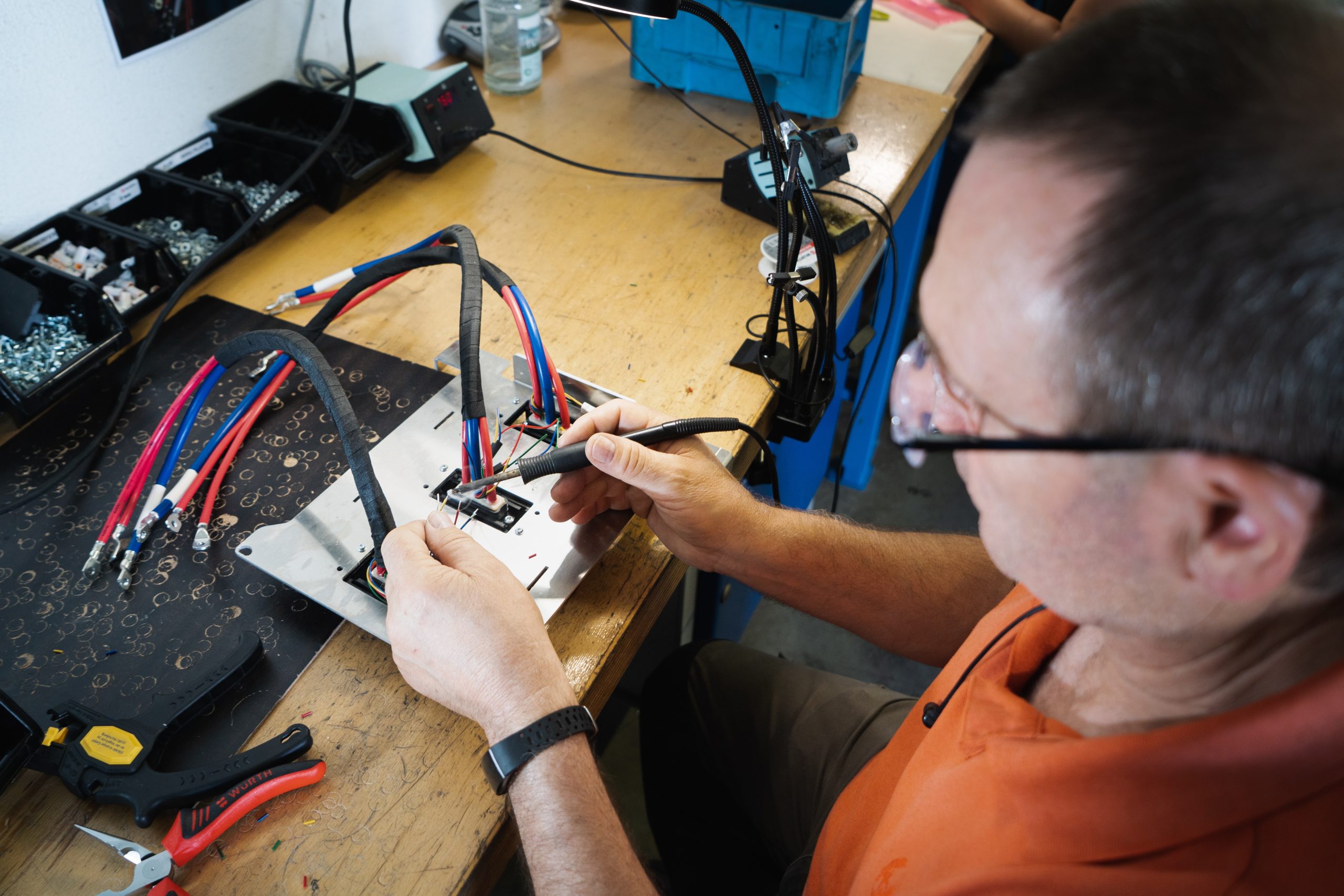 man repairing electronics - Right to repair