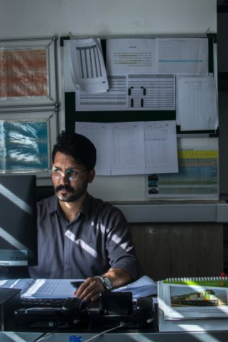 Man at desk - Eco-Friendly Computing