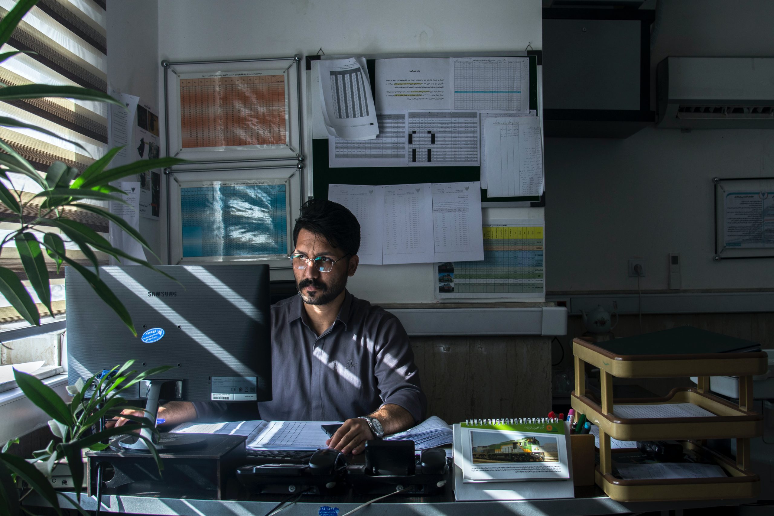 Man at desk - Eco-Friendly Computing