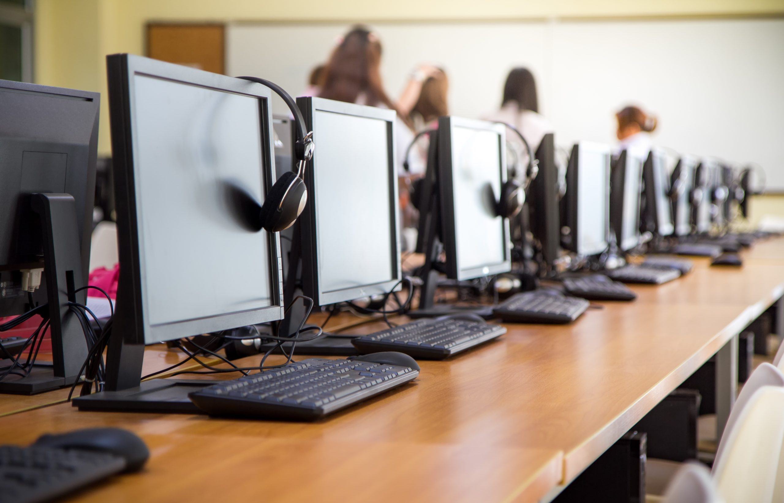 row of computers - Sustainable Campus Device Recycling