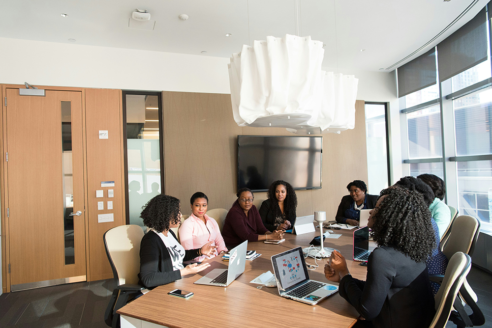 Women Black Leadership around table - Environmental Justice Tech for Black Communities